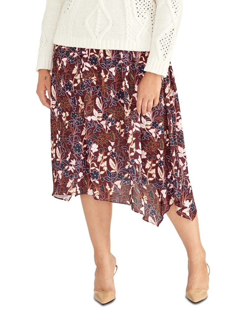 Front of a model wearing a size 1X Rachel Roy Women's Plus Eden Floral Handkerchief Hem Skirt Red Pink Size 1X in Pink by Rachel Roy. | dia_product_style_image_id:310732